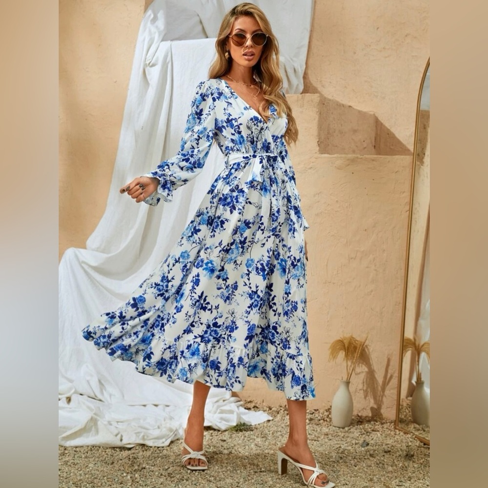 White midi dress with a blue floral print, perfect for Valentine’s Day!